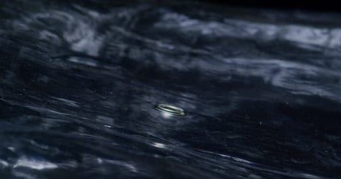 Close up of black marble surface.