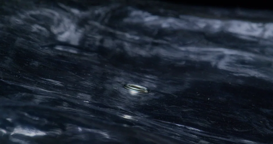 Close up of black marble surface.